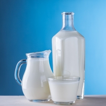glass, bottle and pitcher of milk